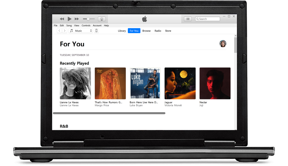 A PC and an iPhone with Apple Music For You.