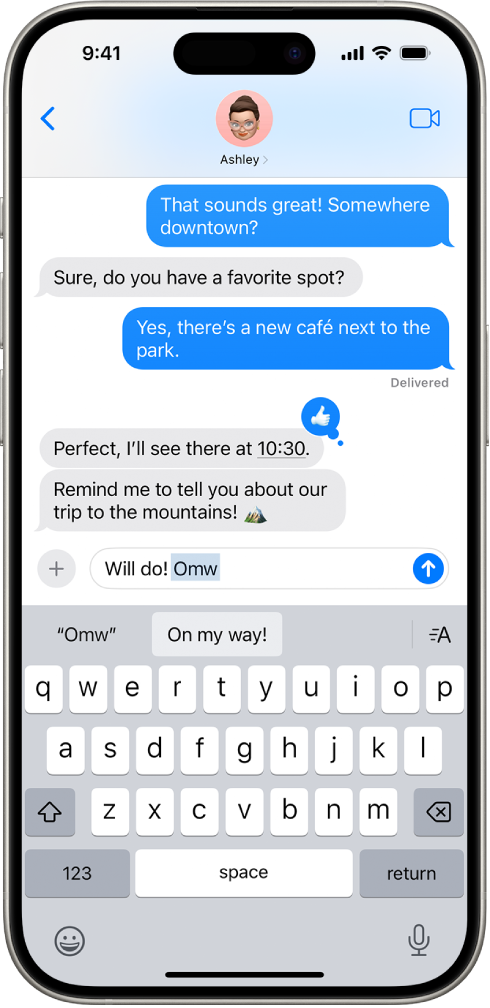 A message with the text shortcut “Omw” typed and the phrase “On my way!” suggested below as replacement text.